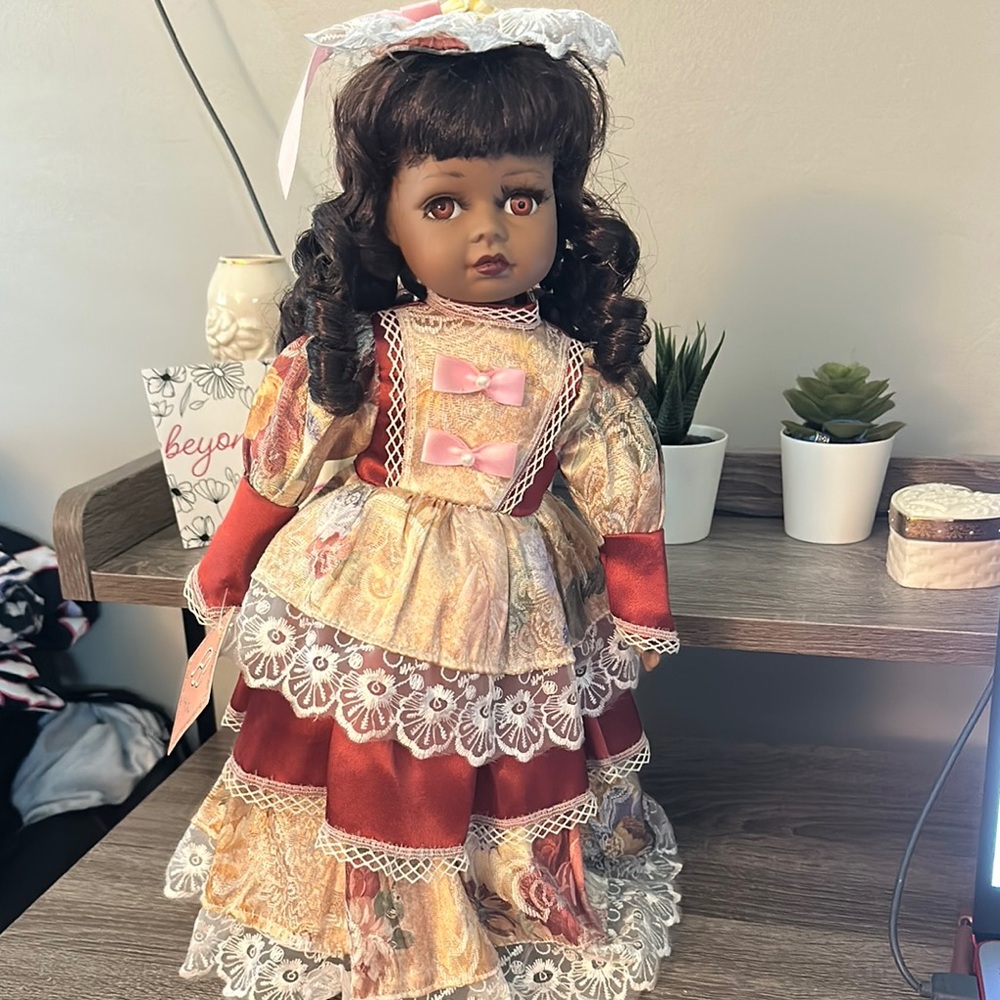 Red and Cream Collectible Doll with Lace Details - Picture 2 of 4